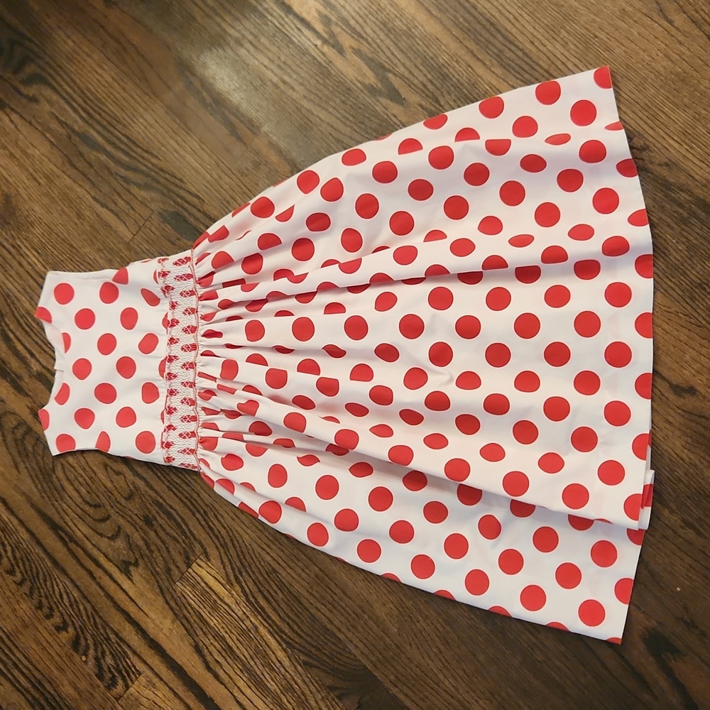 Red and white polka dot smocked dress